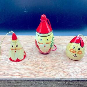 Three wooden Santa Claus with original hangers